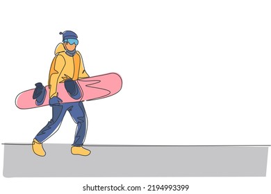 Single continuous line drawing of young sportive snowboarder man walk and hold snowboard at mountain. Outdoor extreme sport. Winter season vacation concept. One line draw design vector illustration
