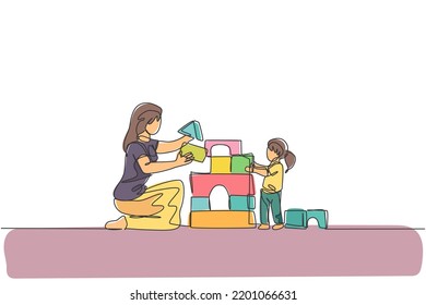 Single continuous line drawing of young mother playing with daughter building house from foam puzzle blocks toy at home, parenthood. Family parenting concept. One line draw design vector illustration