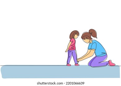 Single continuous line drawing of young mother tying her daughter shoelaces at home before go to school, parenthood. Family parenting concept. Trendy one line draw design vector graphic illustration svg