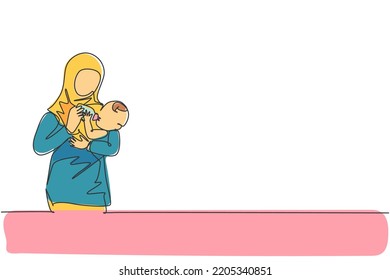 Single continuous line drawing of young Islamic mother hugging and feeding healthy food to her infant baby. Arabian muslim happy family motherhood concept. One line draw design vector illustration