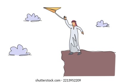 Single Continuous Line Drawing Young Arab Business Man Waving Hand To Flying Paper Plane From Top Of Mountain. Minimalism Metaphor Concept. Dynamic One Line Draw Graphic Design Vector Illustration