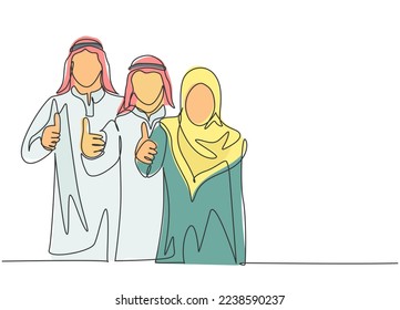Single continuous line drawing of young muslim male and female marketing managers giving thumbs up gestures. Arab middle east cloth shmagh, kandura, thawb. One line draw design vector illustration