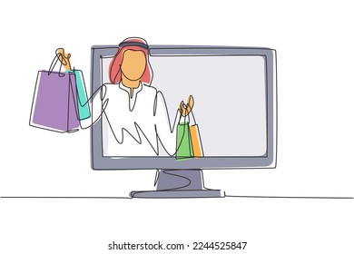 Single continuous line drawing young Arabian man coming out of monitor screen holding shopping bags. Digital lifestyle and consumerism concept. Dynamic one line draw graphic design vector illustration