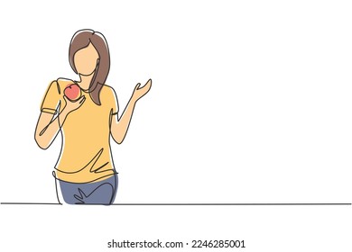 Single continuous line drawing young female having fruits meal with hand. Happy and enjoy dessert at restaurant. Delicious and healthy food. Dynamic one line draw graphic design vector illustration