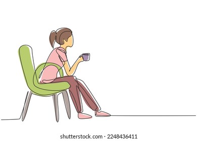 Single continuous line drawing young pretty girl sitting in modern chair, enjoying coffee in front of window at cozy home, side view concept. Dynamic one line draw graphic design vector illustration