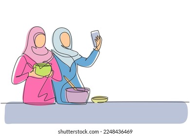 Single continuous line drawing young Arabian man drinking orange juice while making phone call with smartphone and having breakfast at home. Dynamic one line draw graphic design vector illustration