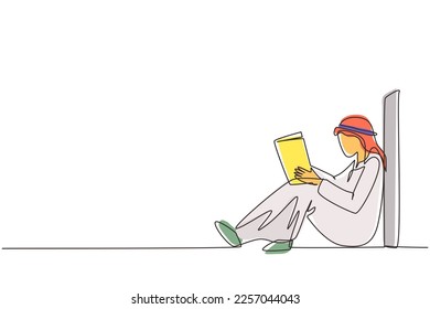 Single continuous line drawing young Arab man sit on floor, reclined on wall of library, read book. Guy studying and reading textbook. Reader sitting on floor and learning. One line draw design vector