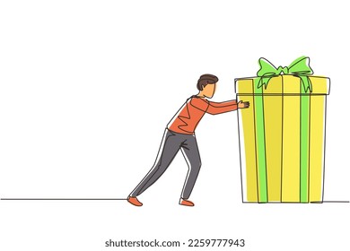 Single continuous line drawing young man pushes in front of him huge gift . Giving gifts for holiday concept. Wrapped birthday gift box with bow. Present, gift, birthday. One line draw design vector