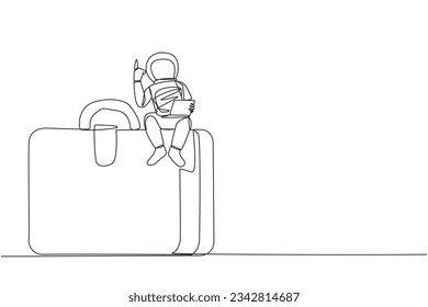 Single continuous line drawing young energetic astronaut sitting on giant briefcase holding laptop raise one hand. The first expedition to the surface of Mars. One line design vector illustration