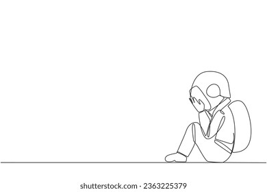 Single continuous line drawing young astronaut sitting while covering face. An unhappy astronaut bemoans the fate of business. Failure to develop business unit. One line design vector illustration