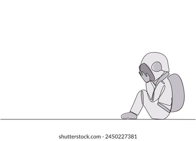 Single continuous line drawing young astronaut sitting while covering face. An unhappy astronaut bemoans the fate of business. Failure to develop business unit. One line design vector illustration