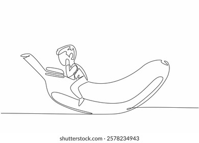 Single continuous line drawing young boy reading on banana. Learn the benefits of fruit for the body. Health conscious. Boy Reading Book at Vegetables and Fruits. One line design vector illustration
