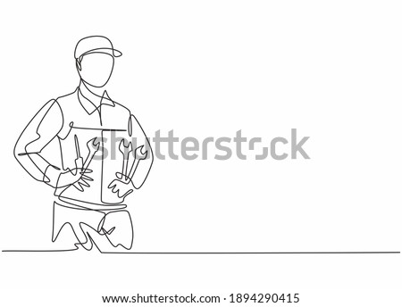 Single continuous line drawing of young man mechanic holding wrench set at car workshop garage. Professional work job occupation. Minimalism concept one line draw graphic design vector illustration