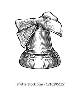 Single engraved bell with bow isolated on white background