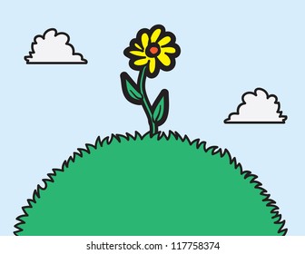 Single flower on top of a grassy hill