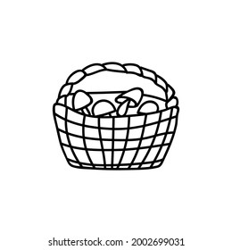 Single hand drawn basket of mushrooms for autumn decoration. Doodle vector illustration. Isolated on a white background.