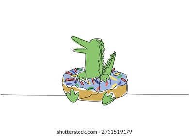 Desenho de linha única de crocodilo verde encantador para conceito de comida doce apresenta animal bonito deitado dentro donut com vidros. Arte colorida representa o dia internacional da comida com réptil de pântano brincalhão