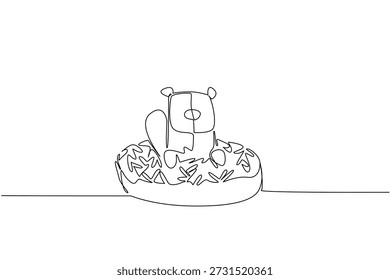 El dibujo de una sola línea de castor juguetón presenta al animal salvaje del río sentado dentro del concepto de dona para pasteles. El diseño minimalista representa un tema del día internacional de la comida para la decoración del acontecimiento de los niños