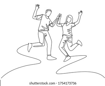 Single line drawing of young happy student couple jumping to celebrate their final exam result graduation together. Campus life education concept. Continuous line draw design vector illustration