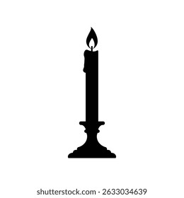 Single lit candle in candlestick silhouette