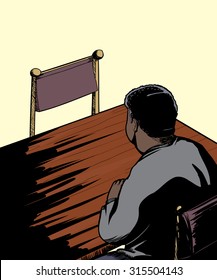 Single man sitting at table facing an empty chair