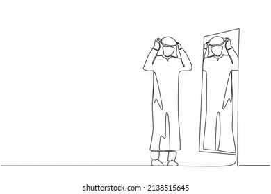Single one line drawing Arab businessman adjusting turban in front mirror  Man checking his appearance in mirror  Male manager looking himself in mirror  Continuous line draw design graphic vector