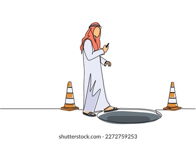 Single one line drawing Arab businessman character going on street watching by smart phone and did not see open manhole. Man walks to business trap. Continuous line design graphic vector illustration