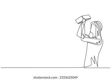 Una sola línea que dibujaba a un hombre de negocios árabe se paraba sosteniendo y girando una cartera vacía. Hombre que quiebra en la dirección de un negocio. No tengas nada de dinero. Ilustración gráfica de diseño de línea continua
