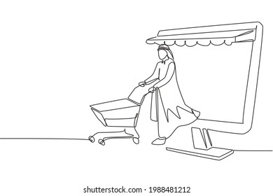 Single one line drawing Arabian man coming out of canopy monitor screen pushing a shopping cart. Digital lifestyle consumerism concept. Modern continuous line draw design graphic vector illustration