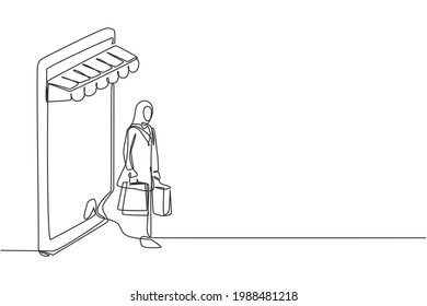 Single one line drawing Arabian woman coming out of canopy smartphone screen holding shopping bags. Digital lifestyle and consumerism concept. Continuous line draw design graphic vector illustration