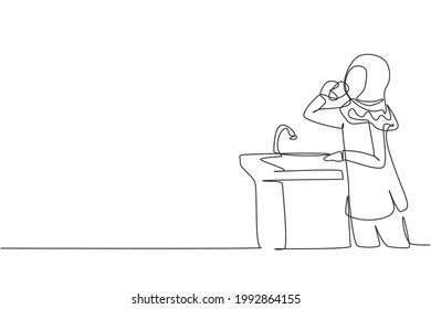 Single one line drawing Arabian girl drinking water from ready-to-drink faucet. Thirst and dehydration due to heat during the day. Fresh moment. Continuous line draw design graphic vector illustration