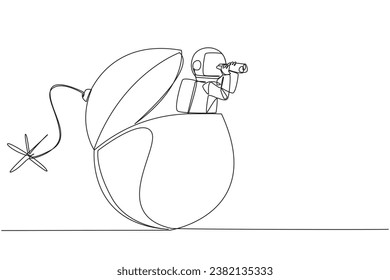 Single one line drawing astronaut emerges from bomb with burning fuse looking for something through binoculars. The expedition deadline will arrive soon. Continuous line design graphic illustration