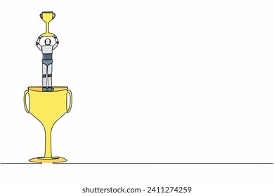 Single one line drawing back view robot stand above big trophy and lifting up winner cup celebrating his award. Future technology development. Continuous line draw design graphic vector illustration