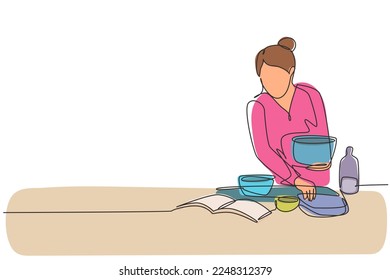 Single one line drawing beautiful woman cooking meal while reading tutorial book on cozy kitchen table at home. Healthy food lifestyle. Modern continuous line draw design graphic vector illustration