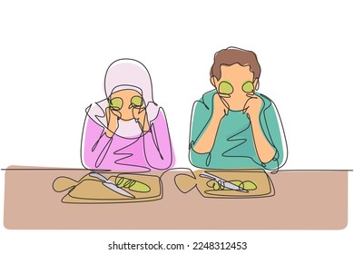 Single one line drawing beautiful Arab wife and her handsome husband are holding slices of cucumber and smiling while cooking in cozy kitchen. Continuous line draw design graphic vector illustration