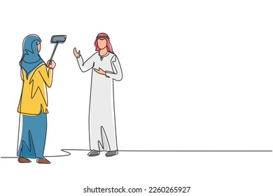 Single one line drawing blogging, vlogging, live video streaming, Arabian influencer opinion. Blogger, vlogger shooting video, create engaging content. Continuous line draw design vector illustration