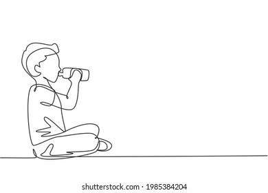 Single one line drawing boy sitting while enjoying a bottle of fresh milk to fulfill his body nutrition. Child health and growth concept. Modern continuous line draw design graphic vector illustration