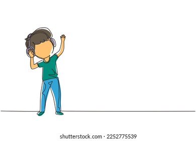 Single one line drawing boy listening to music with headphones on his head. Kid wearing earphones and headphones, listening to music and dancing. Continuous line design graphic vector illustration