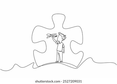 Single one line drawing boy playing with airplanes in the middle of a large puzzle piece. Complexity of mind content. Diversity. World Autism Awareness Day. Continuous line design graphic illustration