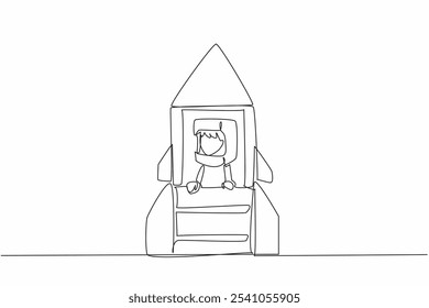 Single one line drawing boy riding a big cardboard rocket wearing cardboard helmet. Aspires to be a spaceship builder that flies to moon. Cosmonautics Day. Continuous line design graphic illustration