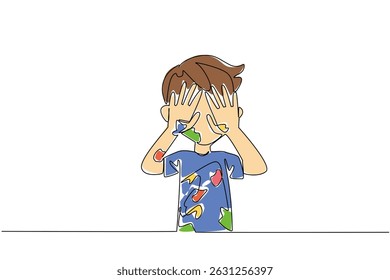 Single one line drawing boy wearing a tshirt full of colorful paint scribbles while covering eyes with hands. Dirty. Messy. Expressive. Happy. Drawing Day. Continuous line design graphic illustration