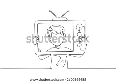 Single one line drawing a boy holding an old television made of cardboard.Channels are changed manually without a remote. The analog tv. Inside Television. Continuous line design graphic illustration