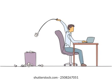 Single one line drawing businessman typing at a work desk throwing wads of paper into the trash. Does not have a clear idea of business progress. Stagnant. Continuous line design graphic illustration