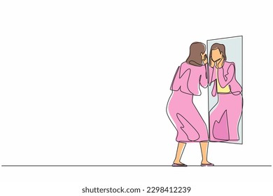 Single one line drawing businesswoman holding her face on reflection mirror. Woman applying lotion on face after bathing or wash her face, looking at mirror. Continuous line draw design graphic vector