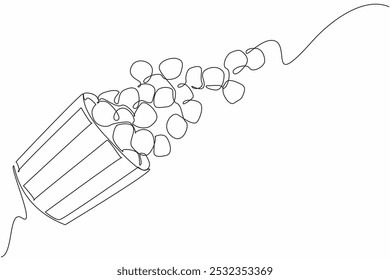 Single one line drawing caramel popcorn flying from a striped paper container. A snack metaphor that makes float. Munchies. National Caramel Popcorn Day. Continuous line design graphic illustration