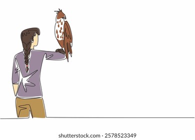 Single one line drawing changeable hawk eagle perched on hand of woman. It is not a good decision to keep a pet. Population decreasing. Woman Holding Bird. Continuous line design graphic illustration