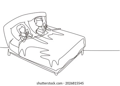Single one line drawing couple lying in bed and looking at phone playing games on gadgets. Home leisure spare time. People spending free time. Continuous line draw design graphic vector illustration