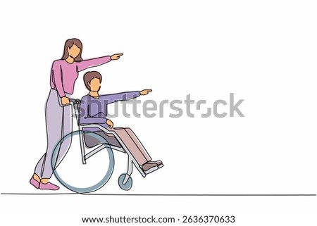 Single one line drawing couple of happy people while pointing in one direction. Caregiver woman pushing man on wheelchair, enjoy health care activity. Continuous line draw design vector illustration