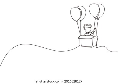 Single one line drawing cute boy sitting in cardboard box with balloons. Little pilot of hot air balloon. Creative kid character playing hot air balloon. Continuous line draw design graphic vector