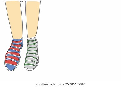 Single one line drawing different stripes between right and left. Comfort comes first, differences are a matter of taste. Colorful socks. Anti Bullying Day. Continuous line design graphic illustration